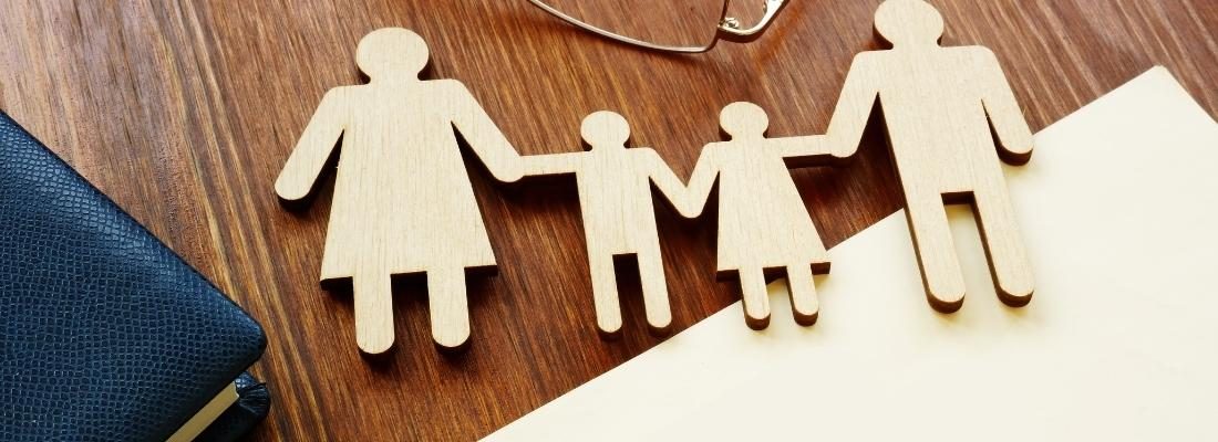 cutout of family holding hands